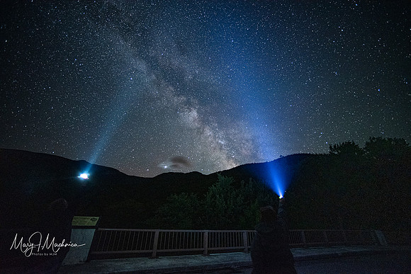 Milky Way Lincoln, New Hampshire.  I'm the light on the left. my friend is on right