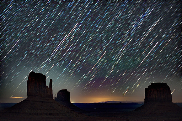 Monument Valley. taken at cabin. set up for star trails & stacked the photo. done wrong looks cool